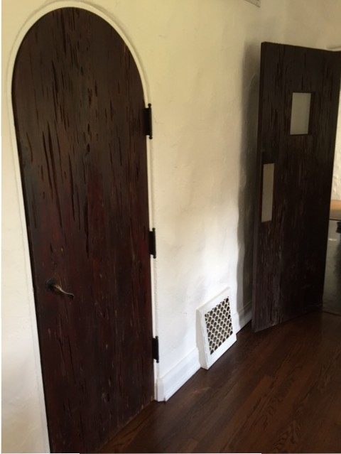 Pecky cypress doors original to the house.