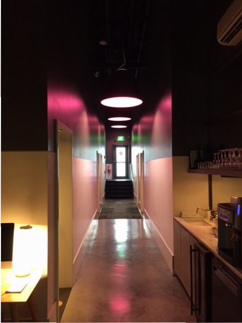 The dramatically lit hallway of The 404.