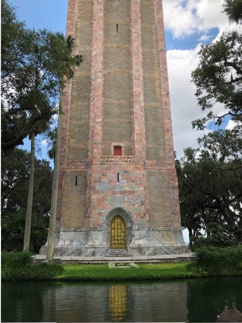 Edward Bok is buried on site in front of the golden tower doors, Lake Whales, Florida.