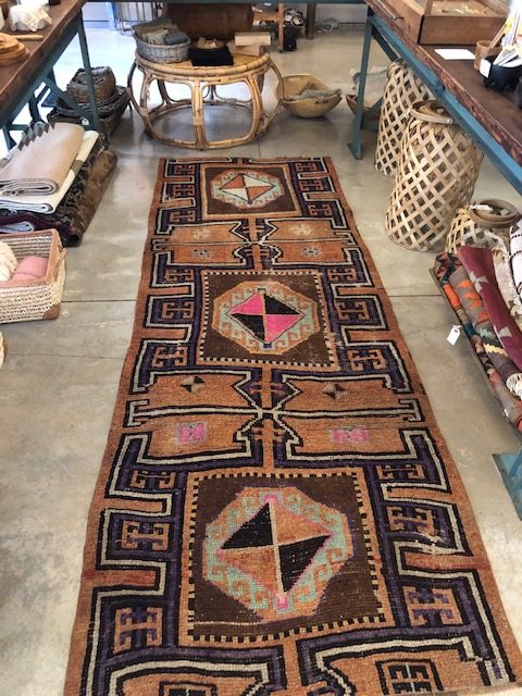 This lovely rug would have spiced up my hallway.