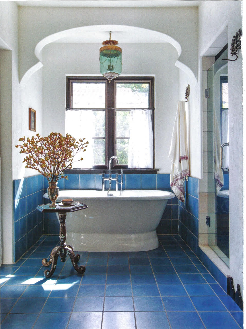 Colorful Character article - page 9 - design by interior designer Mary Margaret Vasquez - vibrant blue tile bathroom